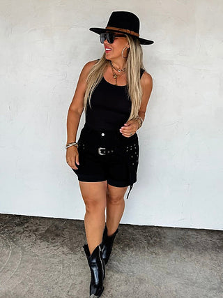 Black denim high-rise shorts with front button, pockets, and belt loops