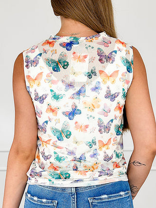 Sleeveless tank top back view with colorful butterfly print and high round neckline