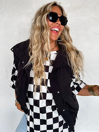 Lightweight puffer vest with hood, front zipper, black with checkered accents