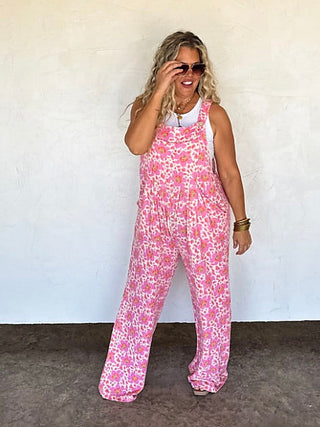 Pink floral ribbed overalls with wide legs and front bib pocket