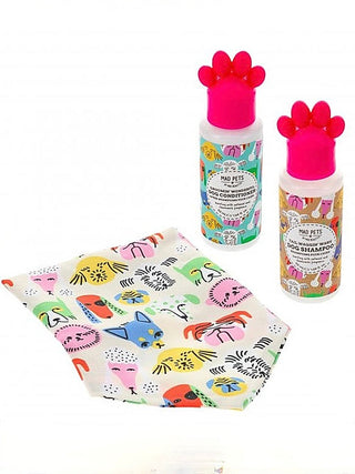 Pet grooming set: animal-print cloth and two pink-capped bottles