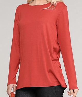 Rust long-sleeve rayon blend top with rounded neckline and side ruching