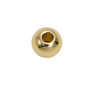 Gold charm bail with circular opening, front view