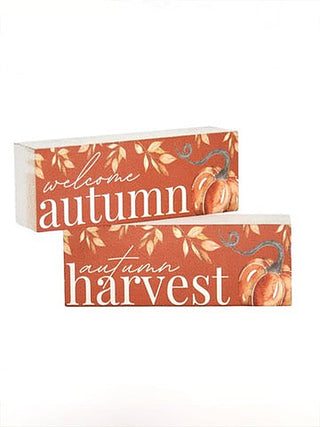 Wood decor set with stacked blocks reading “welcome autumn harvest” in autumn orange