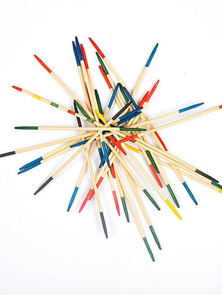 Multi-colored wooden pick-up sticks with red, blue, green, and yellow sticks bundled