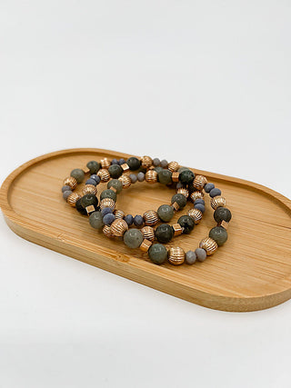 Beaded bracelet set with dark green and brown stone beads, gold-tone spacers