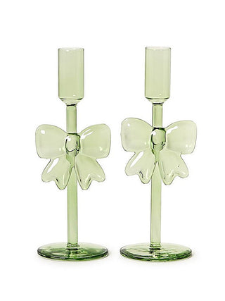 Green glass candleholder set of 2 with flower-shaped arms and ribbed stems
