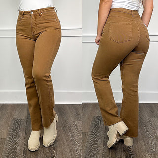 Brown high-rise straight-leg jeans with raw hem, button-fly, and back pocket detail