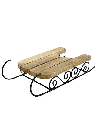 Rustic wooden sled decoration with black curled metal runners