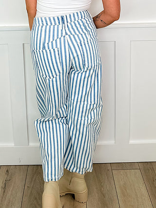 High-rise barrel-leg striped jeans with gathered waistband and blue-and-white stripes