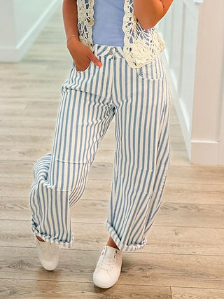 High-rise barrel-leg striped jeans in light blue with white stripes, no distress