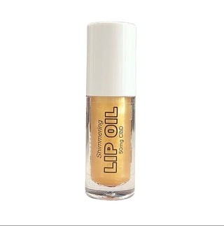 Tinted lip oil bottle in gold-peach shade, clear cap, 50mg CBD
