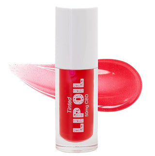Tinted lip oil bottle in bright red shade with 50mg CBD text on label