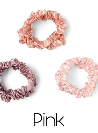 Satin scrunchies in pink tones, gathered ruffle style