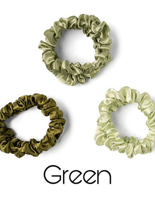 Satin scrunchies in green tones, gathered ruffle style