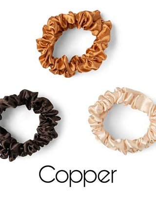 Satin scrunchies in copper and brown tones, gathered ruffle style