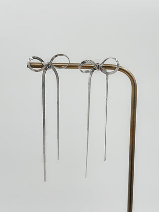 Silver drop earrings with linked circle charms and long hanging metal strands