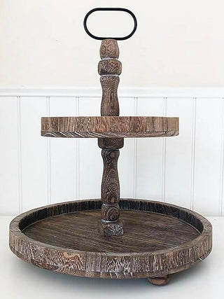 Brown wooden tiered tray with round base and top serving platform