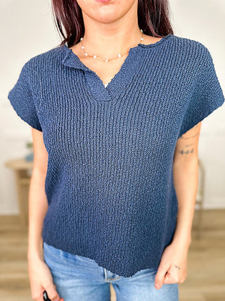 Navy blue cotton short-sleeve knit sweater top with V-neck and ribbed texture