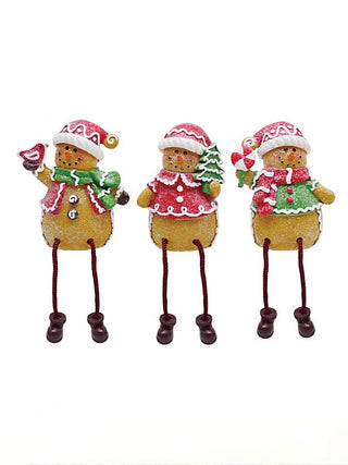 Resin shelf sitter set of three standing gnome characters in festive red and green.