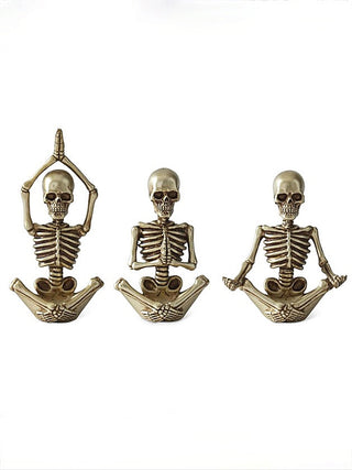 Gold resin skeleton figurine decor in a kneeling pose