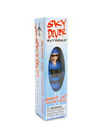 Sky diver toy in box with blue suit, molded parachute hood and face mask