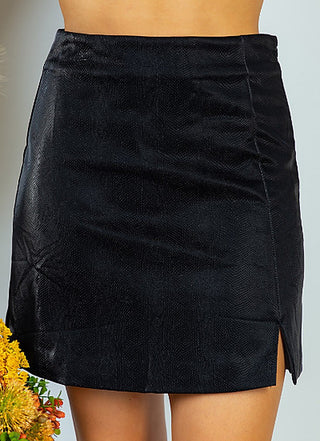 Black textured mini skirt with side slit and stitched panels, straight hem