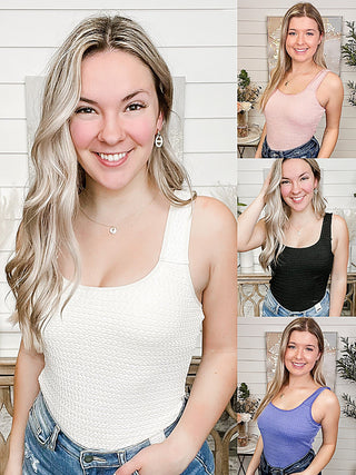 Cream sleeveless scoop-neck bodysuit top with textured knit look