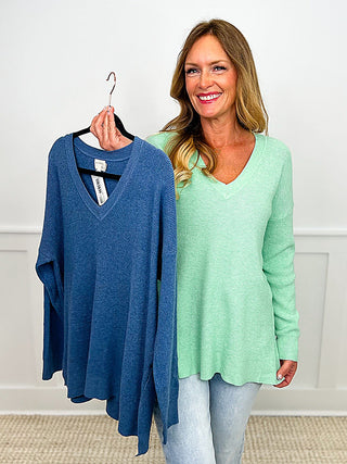 Mint and denim waffle knit V-neck long-sleeve tops on hangers