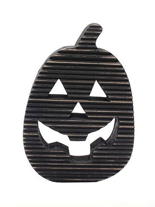 Dark striped wooden pumpkin decor with carved jack-o'-lantern face