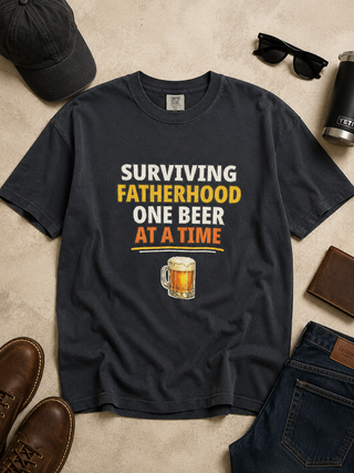Surviving Fatherhood Cotton Short Sleeve Black Avery Mae Graphic Tee Shirt (Comfort Colors)