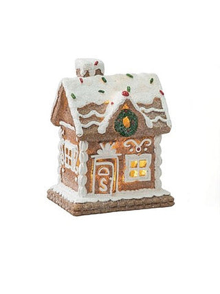 Resin light-up gingerbread house decoration with front windows and candy roof