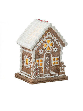 Resin light-up gingerbread house decoration with white frosting roof, side view
