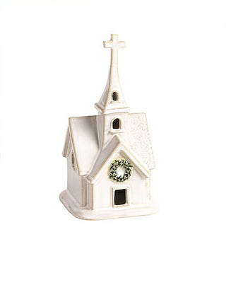 Ceramic church house decor with front porch, green wreath detail, and cross