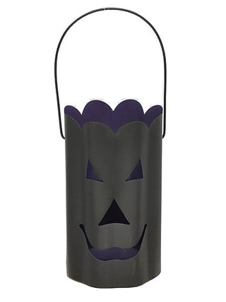 Black metal lantern with carry handle and smiling jack-o'-lantern face design