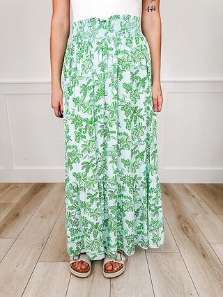 Green and white leaf-print rayon maxi skirt with tiered, gathered hem