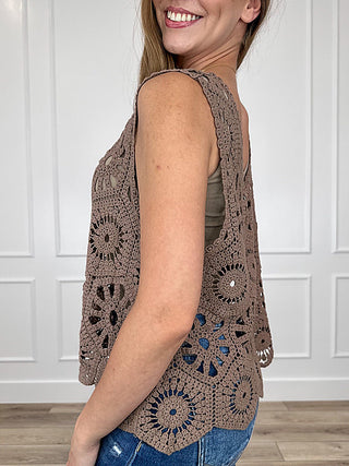 Brown crochet tank top side view with cutout floral motifs and sleeveless armholes
