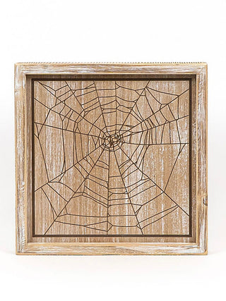 Reversible wood decor frame with dark spiderweb design in border frame