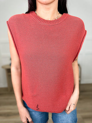 Coral red knit sweater top with cap sleeves and ribbed crew neck