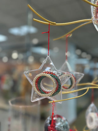 WHIT Christmas hair tie ornament: clear star with beaded multicolor ring