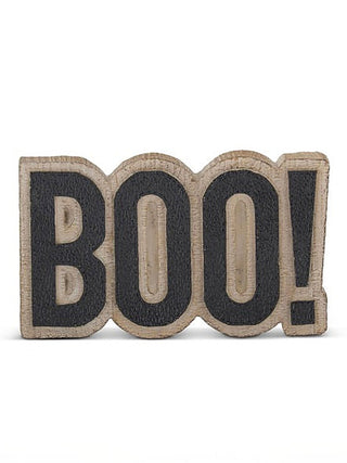 Wood shelf sitter sign reading “BOO!” with dark letters on natural wood backing