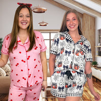 Women's pajamas and PJ sets: pink cherry print button up pajama set and Halloween pumpkin print short pajama set on regular and curvy models