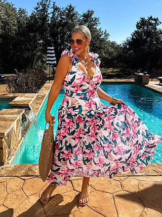 Pink floral swim dress with ruffled straps and tiered skirt